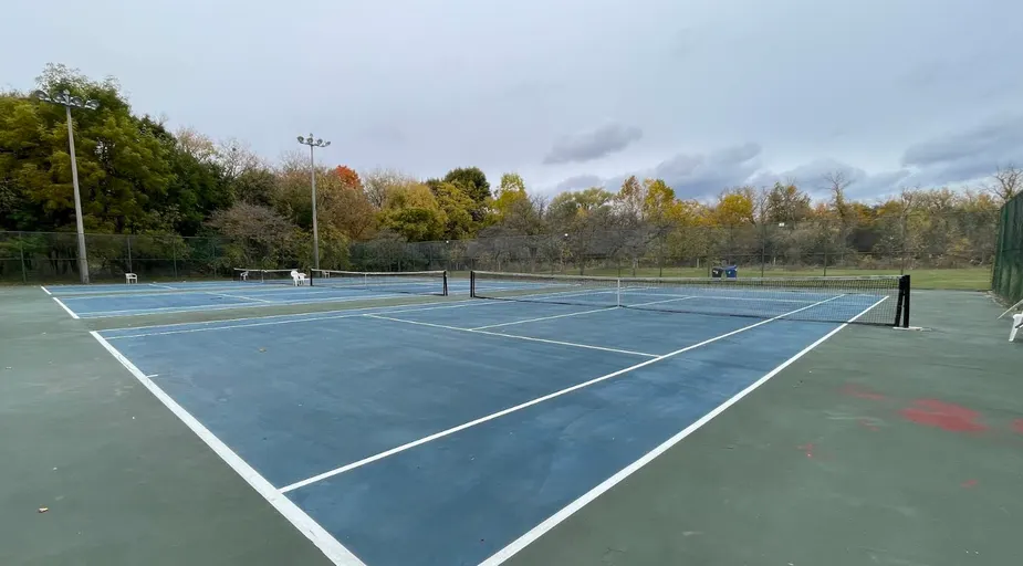 An Image of Tennis Courts at Albion Gardens Park in Toronto