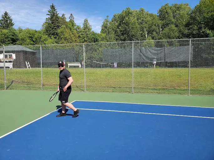 An Image of Tennis Courts at Beaumaris Yacht Club in Milford Bay