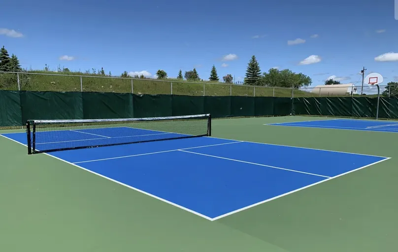 An Image of Tennis Courts at Birdtail Riverside Park in Birtle