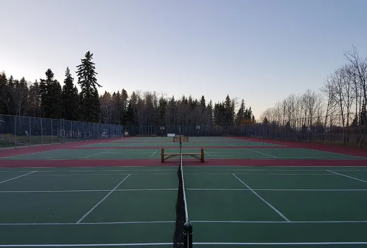 An Image of Tennis Courts at Clear Lake Tennis Club in Wasagaming