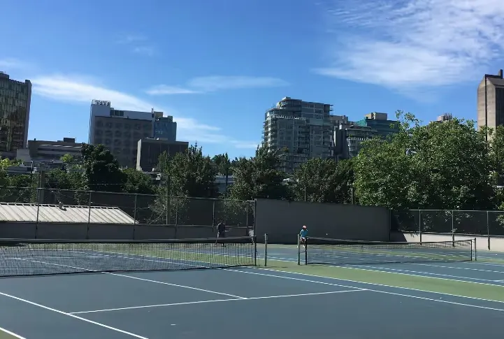An Image of Tennis Courts at False Creek Public Tennis Club in Vancouver