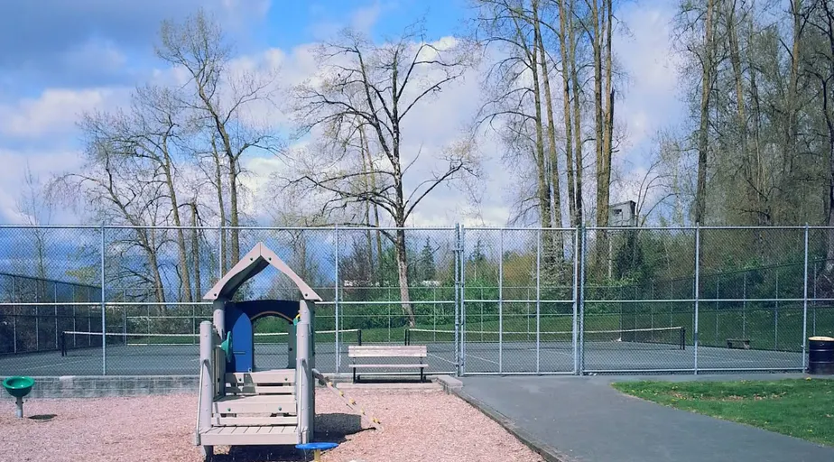 An Image of Tennis Courts at Greenaway Park in Surrey