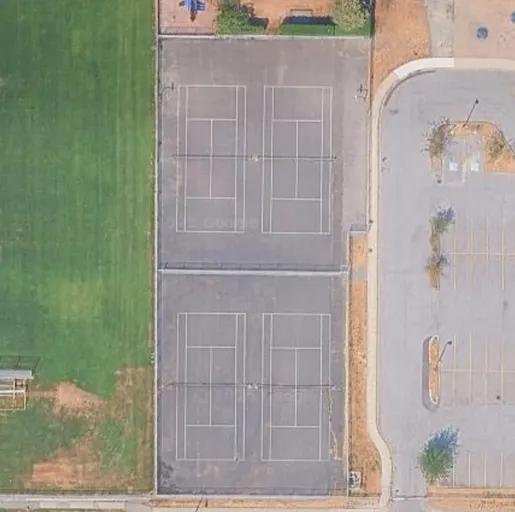 An Image of Tennis Courts at Guildford Secondary in Surrey