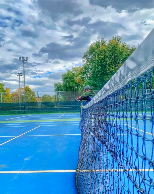 An Image of Tennis Courts at Riverside Park in Cambridge