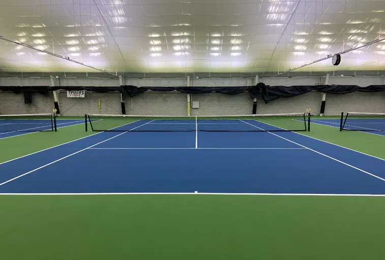 An Image of Tennis Courts at Tennis 13 in Laval