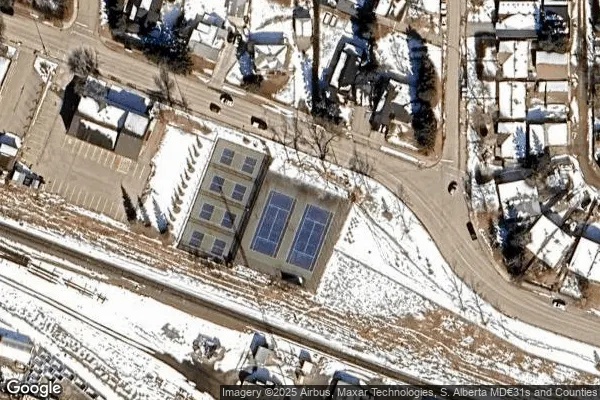 An Image of Tennis Courts at Quigley Park in Cochrane