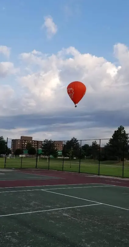 An Image of Tennis Courts at White Oaks Park in London