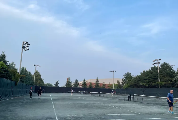 An Image of Tennis Courts at Pine Point Tennis Club in Toronto