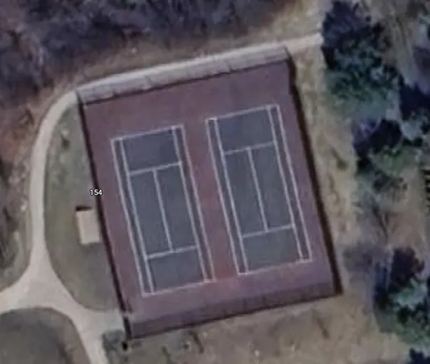 An Image of Tennis Courts at Racoon Park in Richmond Hill