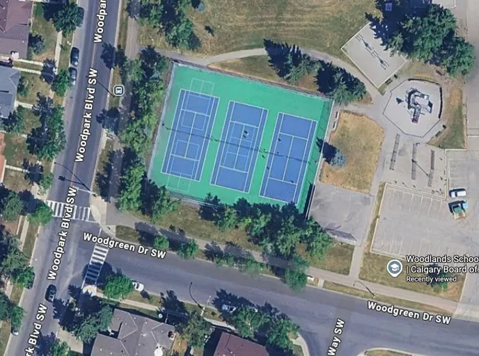 An Image of Tennis Courts at Woodlands School Tennis Court in Calgary