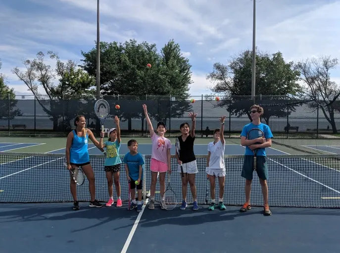 A picture representing the tennis lessons run by Kew Gardens Tennis Club