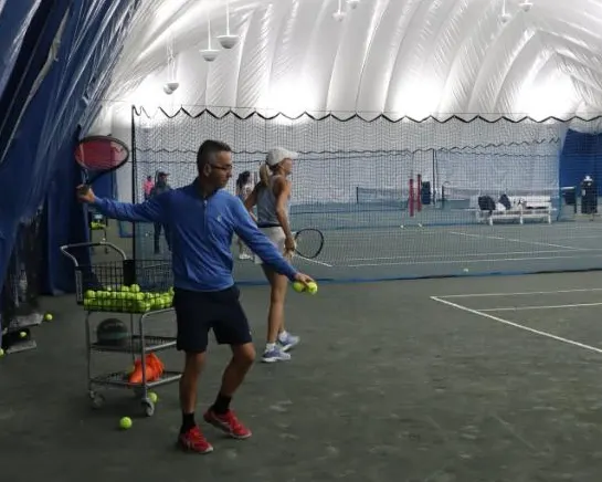 A picture representing the tennis lessons run by Lambton Golf & Country Club
