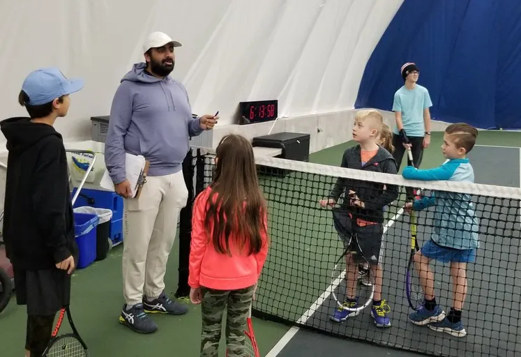 A picture representing the tennis lessons run by Ancaster Tennis Club