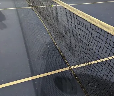 A picture representing the tennis lessons run by Iroquois Park Sports Centre