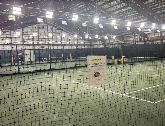 A picture representing the tennis lessons run by North London Optimist Community