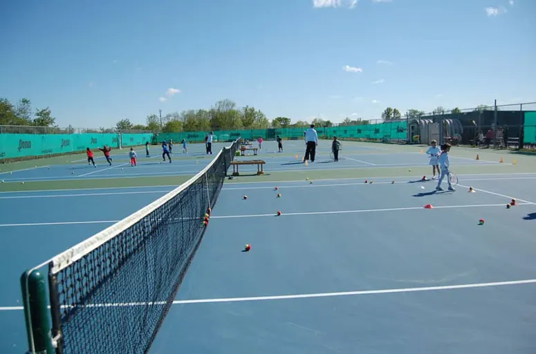 A picture representing the tennis lessons run by Joshua Creek Tennis