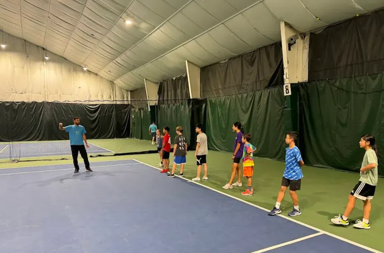 A picture representing the tennis lessons run by JB Tennis