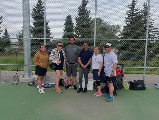 A picture representing the tennis lessons run by Edmonton Junior Tennis Society