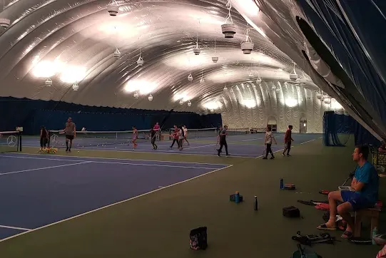 A picture representing the tennis lessons run by The Tennis Centre - Surrey