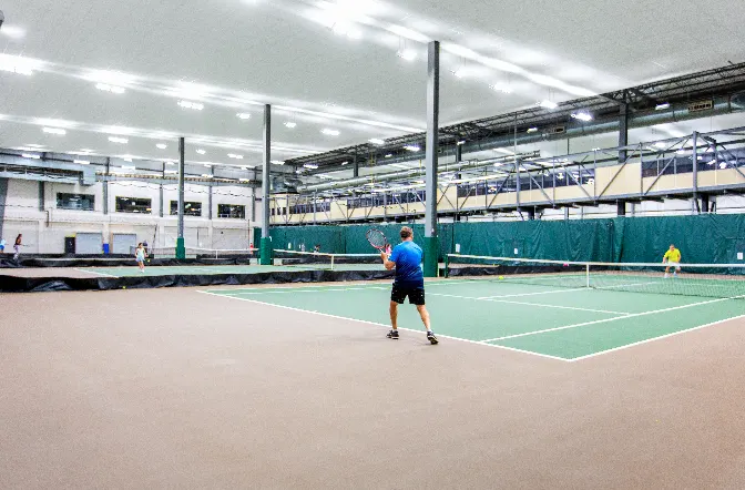 A picture representing the tennis lessons run by Saville Tennis Centre